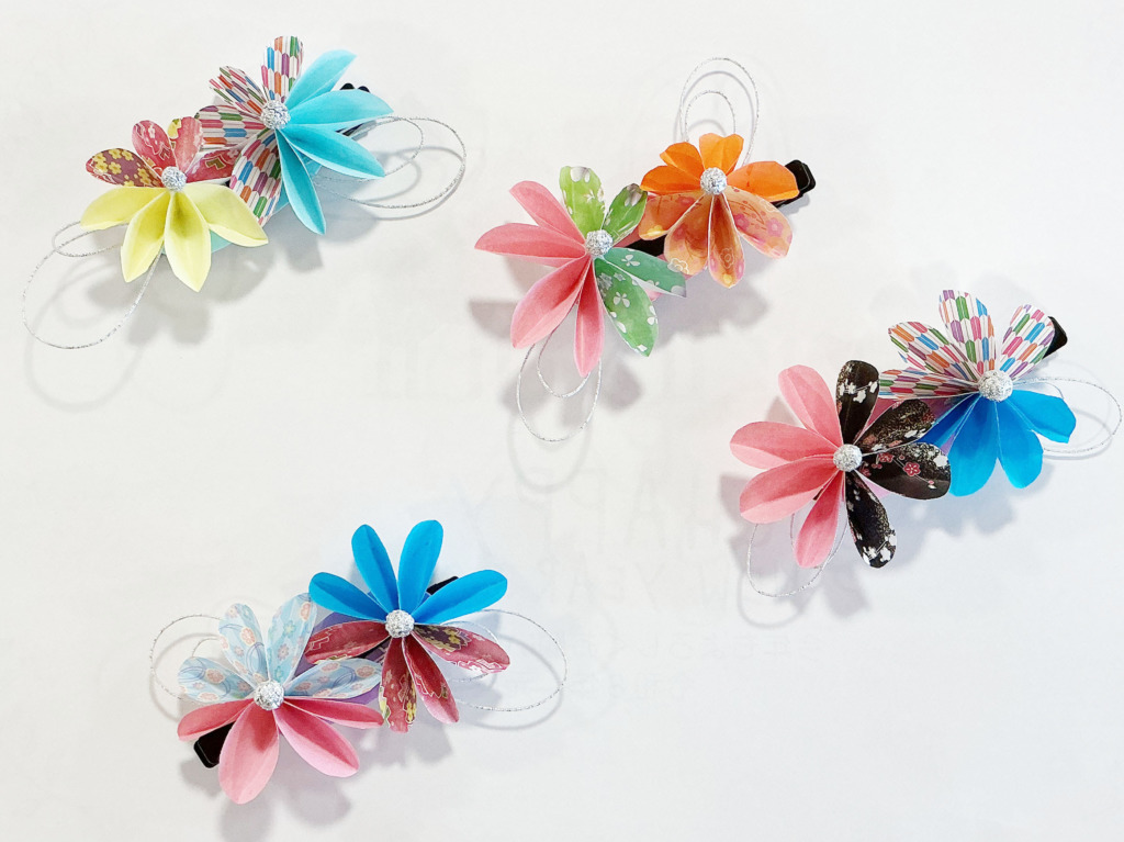 スタッフ手製の花のアクセサリー